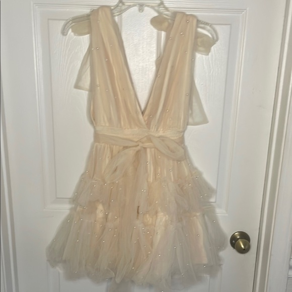 Cream Fit and Flare Mini Dress with Flutter Sleeves - Picture 2 of 9